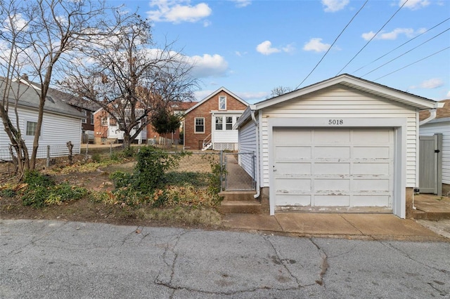 single story home with a garage