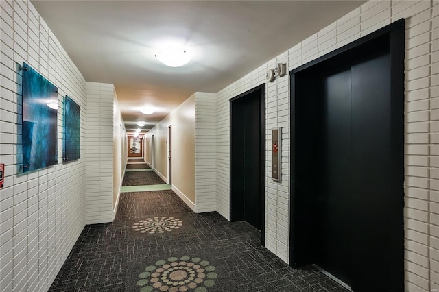 corridor featuring elevator