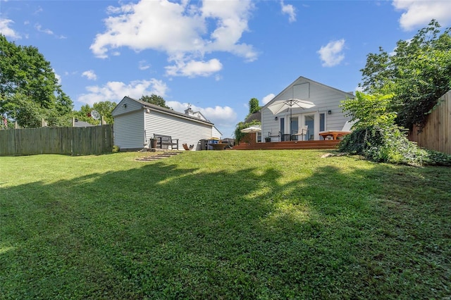 view of yard featuring a deck