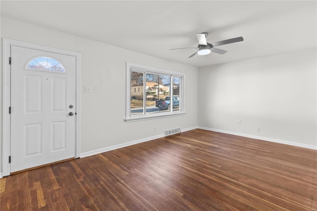 foyer with ceiling fan and dark hardwood / wood-style floors