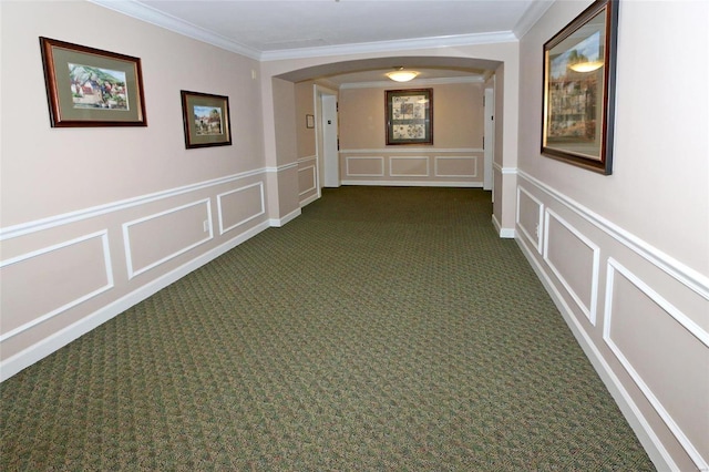 hallway with carpet floors and ornamental molding