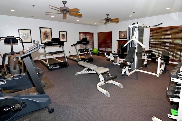 workout area featuring ceiling fan