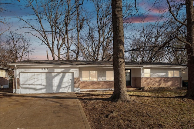 ranch-style home with a garage