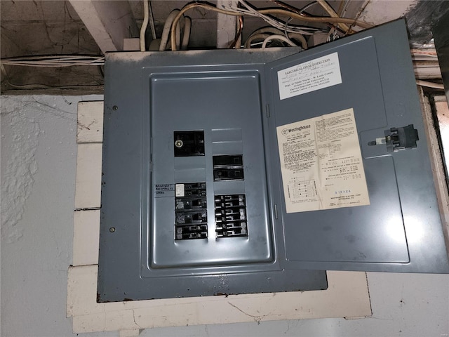 utility room featuring electric panel