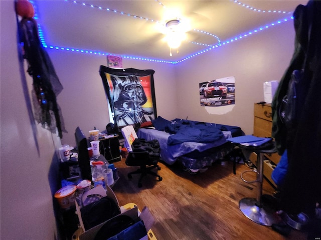 bedroom featuring wood finished floors