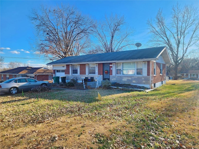 view of front of property with stone siding, a front lawn, and brick siding