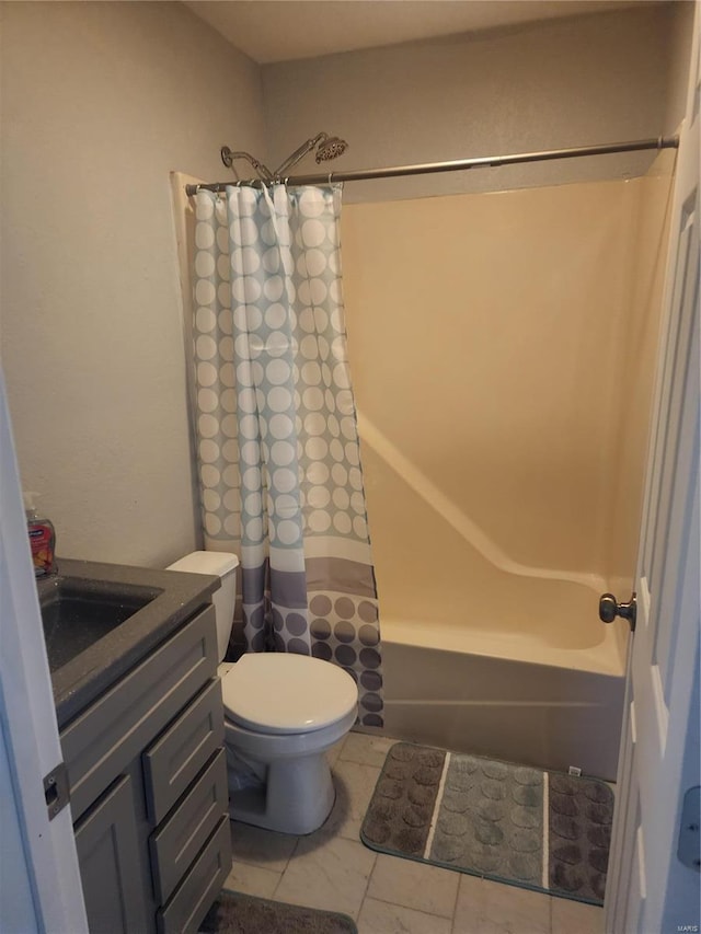 full bathroom with toilet, vanity, shower / tub combo with curtain, and tile patterned flooring