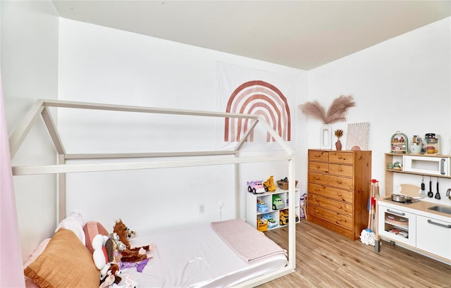 bedroom featuring light hardwood / wood-style floors