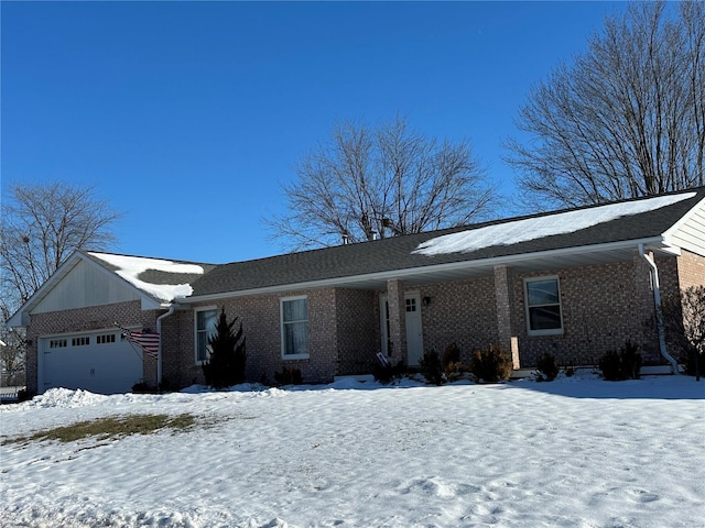 ranch-style home featuring a garage