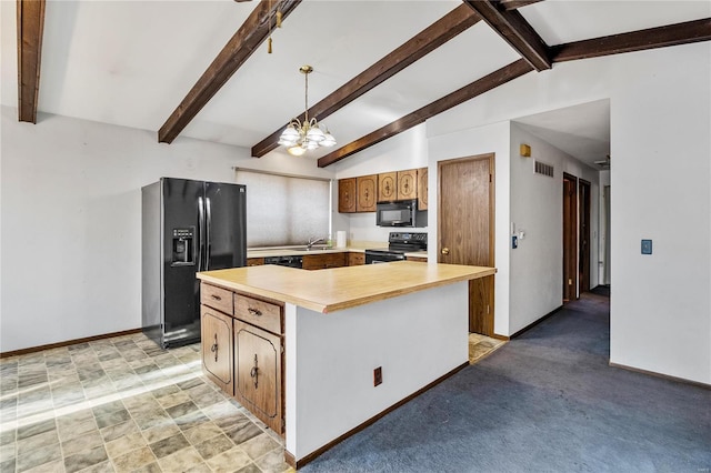 kitchen with a center island, sink, lofted ceiling with beams, decorative light fixtures, and black appliances