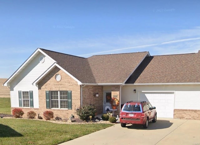 ranch-style house with a front yard and a garage