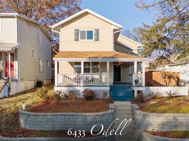 view of front of home with covered porch and central AC