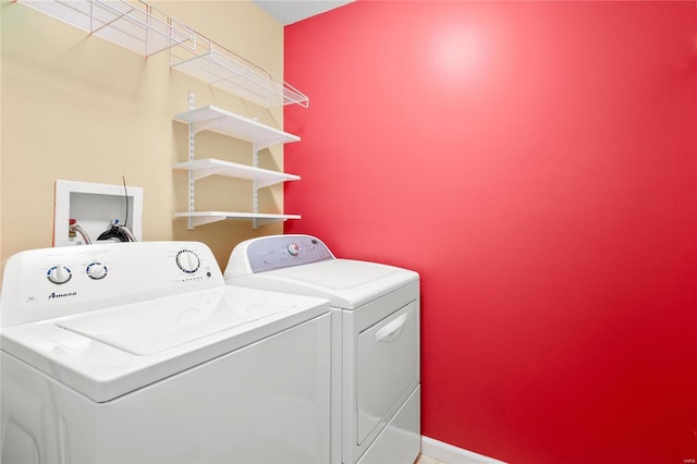 laundry room featuring washer and clothes dryer