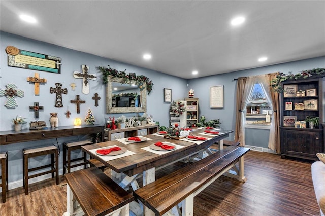 dining room featuring dark hardwood / wood-style flooring