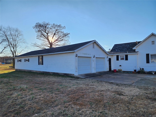 garage with a lawn