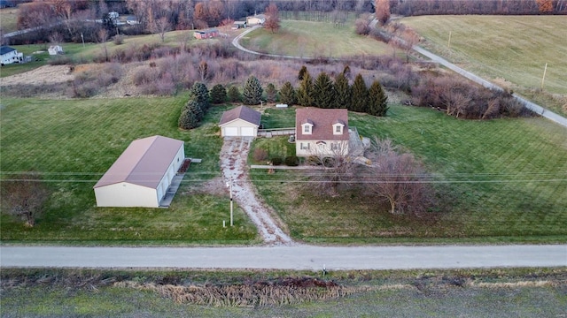 birds eye view of property featuring a rural view