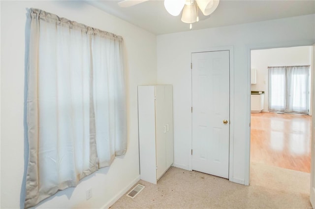 bathroom featuring ceiling fan