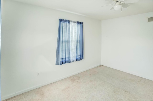 unfurnished room featuring carpet flooring and ceiling fan