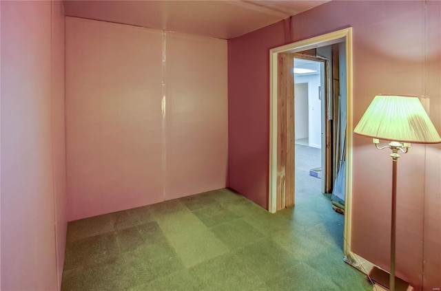 spare room with light carpet