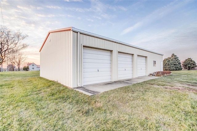 garage with a yard