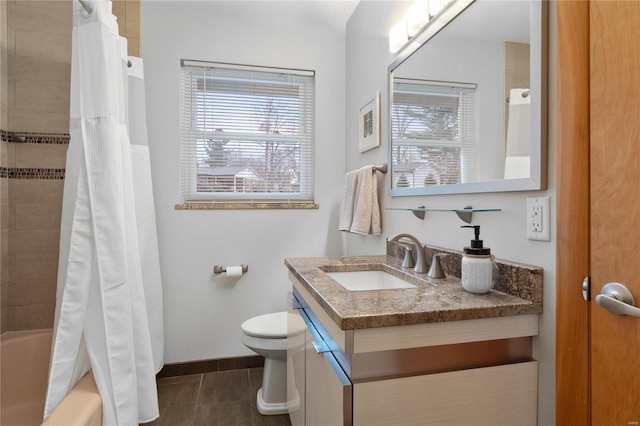 full bathroom featuring tile patterned floors, vanity, toilet, and shower / bath combo with shower curtain