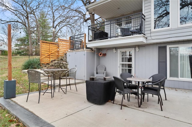 view of patio / terrace with a balcony