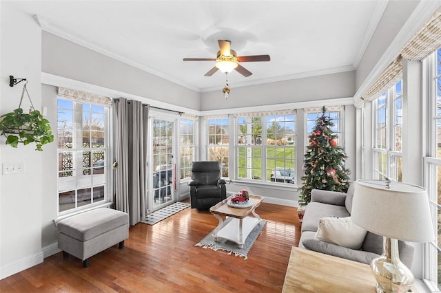 sunroom with ceiling fan