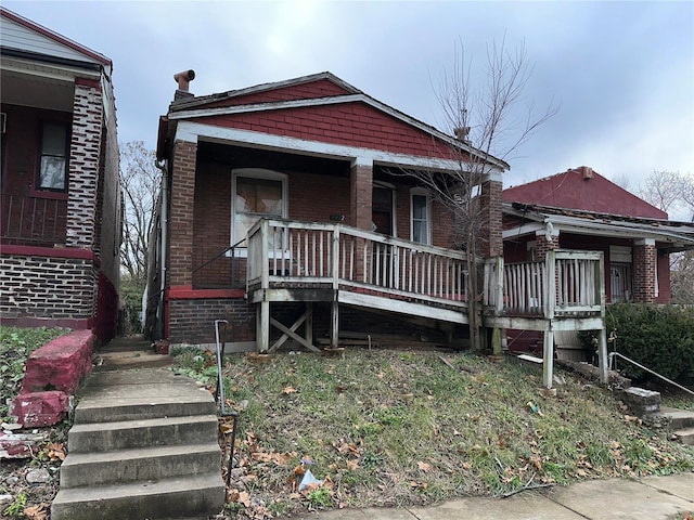 bungalow-style home featuring covered porch