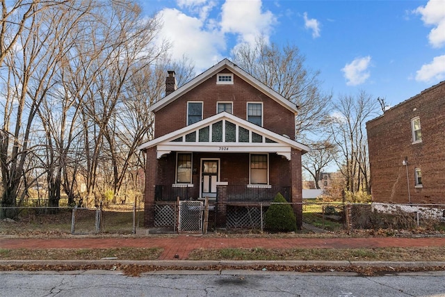 view of front of property featuring covered porch