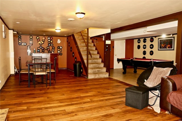 interior space featuring wood-type flooring and pool table