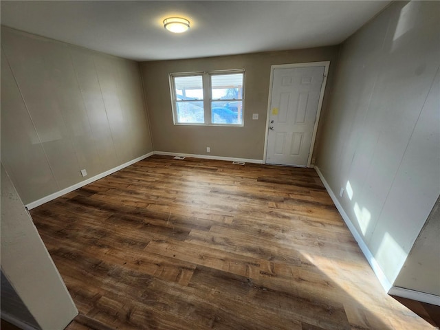 foyer entrance with wood-type flooring