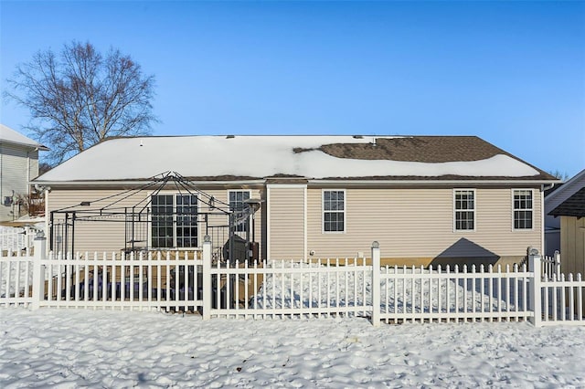 view of snow covered property