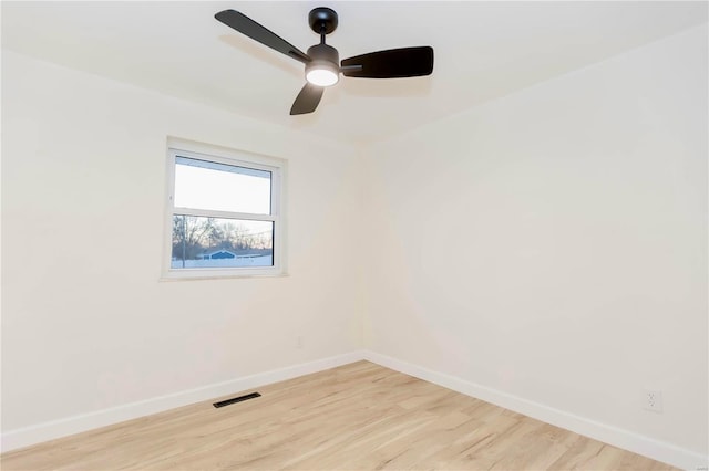 spare room with ceiling fan and light hardwood / wood-style floors