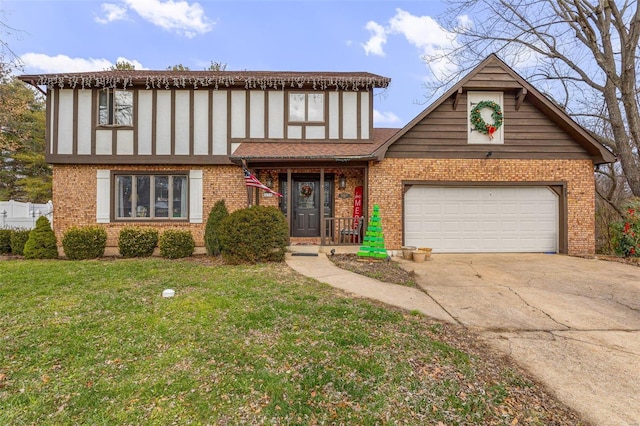 view of front of property with a garage and a front yard