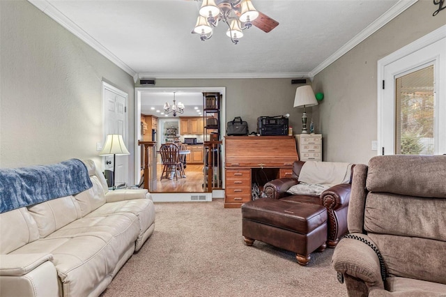 carpeted living room with ceiling fan with notable chandelier and ornamental molding