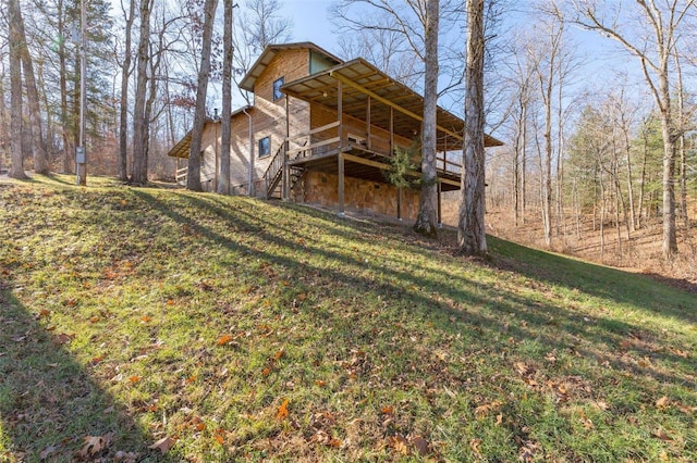 view of yard featuring a wooden deck