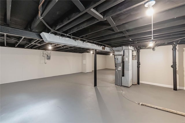 basement featuring heating unit