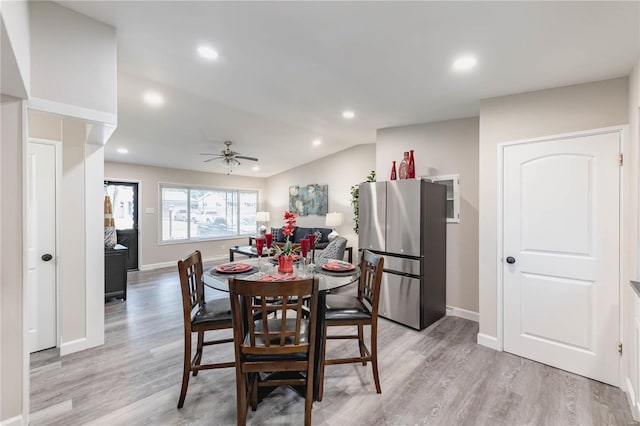 dining area featuring light hardwood / wood-style flooring and ceiling fan