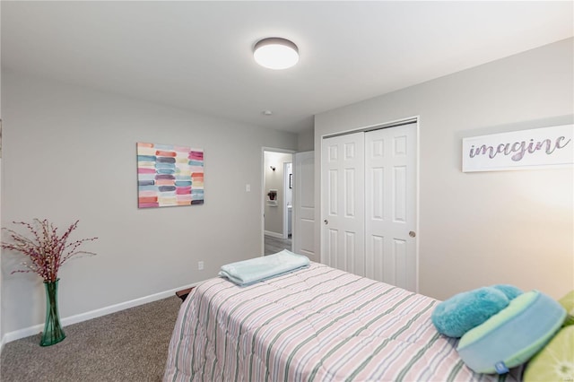 bedroom with carpet and a closet