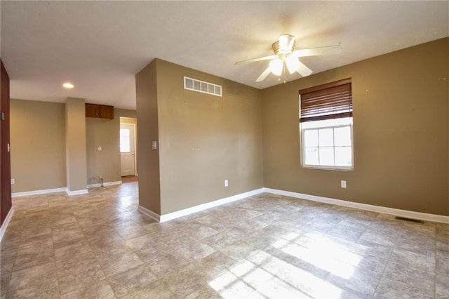 empty room featuring ceiling fan