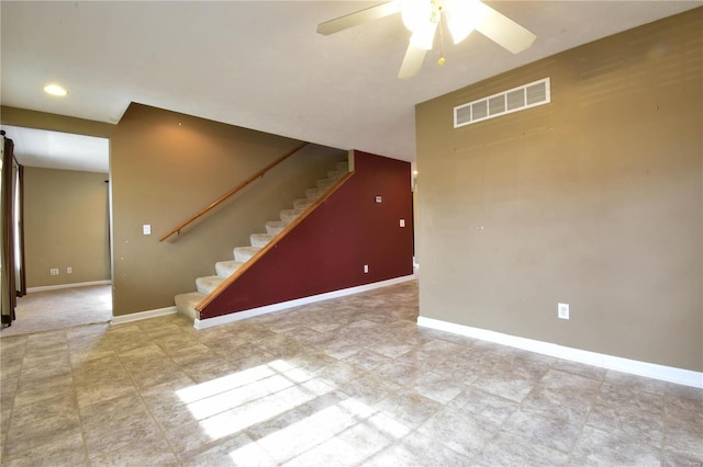 basement with ceiling fan