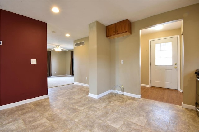 spare room featuring ceiling fan