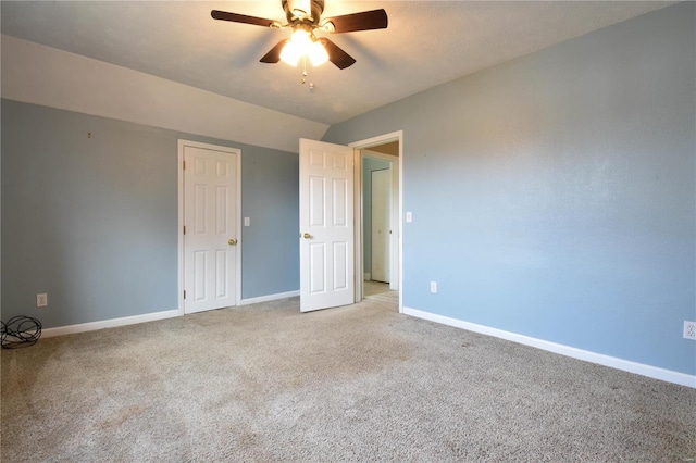 unfurnished room with ceiling fan and light colored carpet