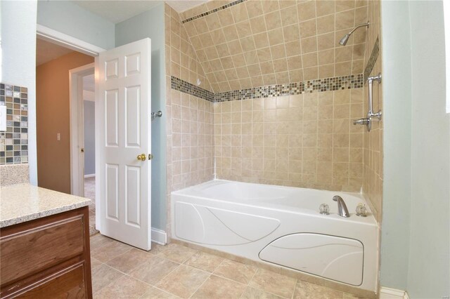 bathroom with tile patterned floors and vanity