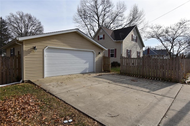 exterior space with an outbuilding and a garage