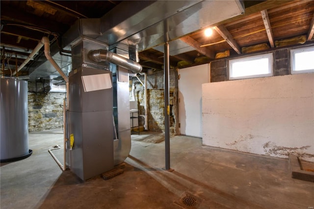 basement with heating unit and water heater