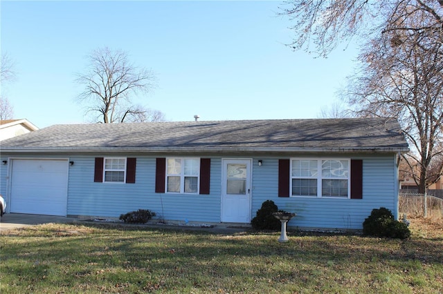 single story home featuring a front yard and a garage