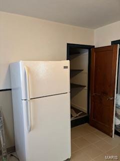 kitchen featuring white refrigerator