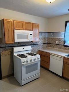 kitchen featuring white appliances