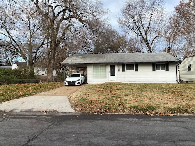 view of front of home with a carport